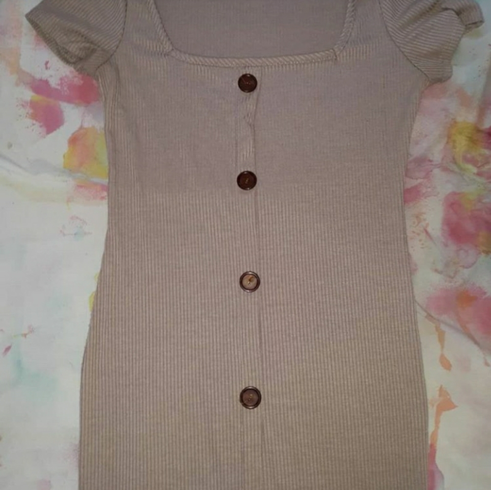 3 separate women's dresses.